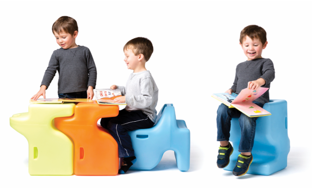 Children Demonstrating the Vidget Ergonomic Furniture as a chair and table