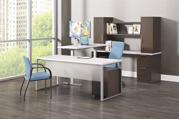 The Coordinate raised to standing level as a secondary desk in a private office.